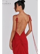 Red Astrid backless maxi dress by Lumina Vancouver, stylish wedding guest gown with elegant flowy fabric and fitted design.