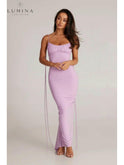 Red Astrid backless maxi dress by Lumina Wear, perfect for wedding guests, featuring elegant flowing fabric and a stylish backless design.