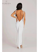 Red Astrid backless maxi dress by Lumina Vancouver, elegant wedding guest gown with a flowing silhouette and stylish design.
