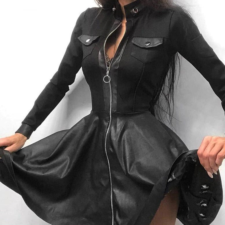 Black faux leather mini dress by Lumina Wear featuring a fitted silhouette and stylish design, perfect for trendy fashion looks.