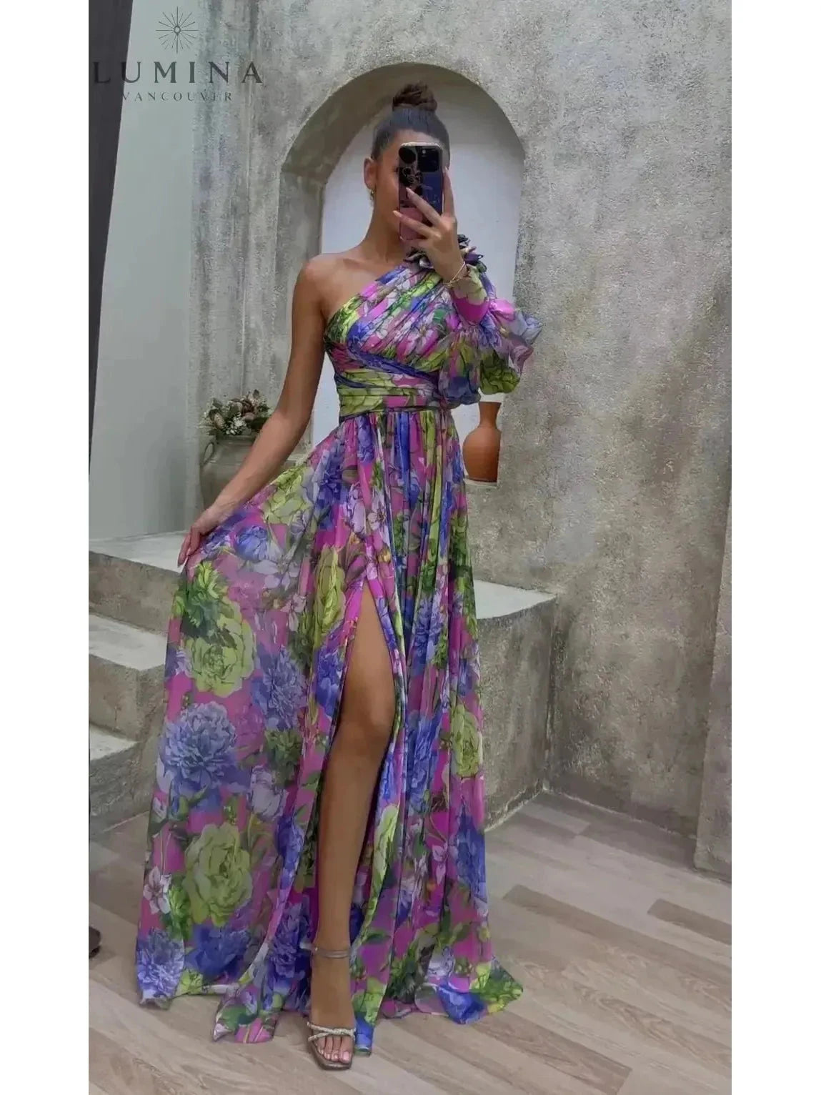 Purple Audrey flowing gown by Lumina Vancouver, elegant wedding guest dress with a flattering silhouette.