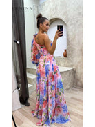 Purple Audrey flowing gown, elegant wedding guest dress by Lumina Vancouver, showcasing its graceful, flowing silhouette.