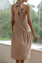 Sylvi Moonstone Silk Halter Dress by Lumina Vancouver in khaki, featuring a mini dress design with elegant moonstone silk fabric.