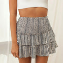 Aurelie bohemian skirt by Lumina Wear featuring playful ruffles and vibrant pink print, perfect for casual summer outfits.