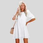 Lumina Vancouver Lempi Celeste Moonshadow mini dress in orange, short silhouette with moonshadow pattern, size XS.
