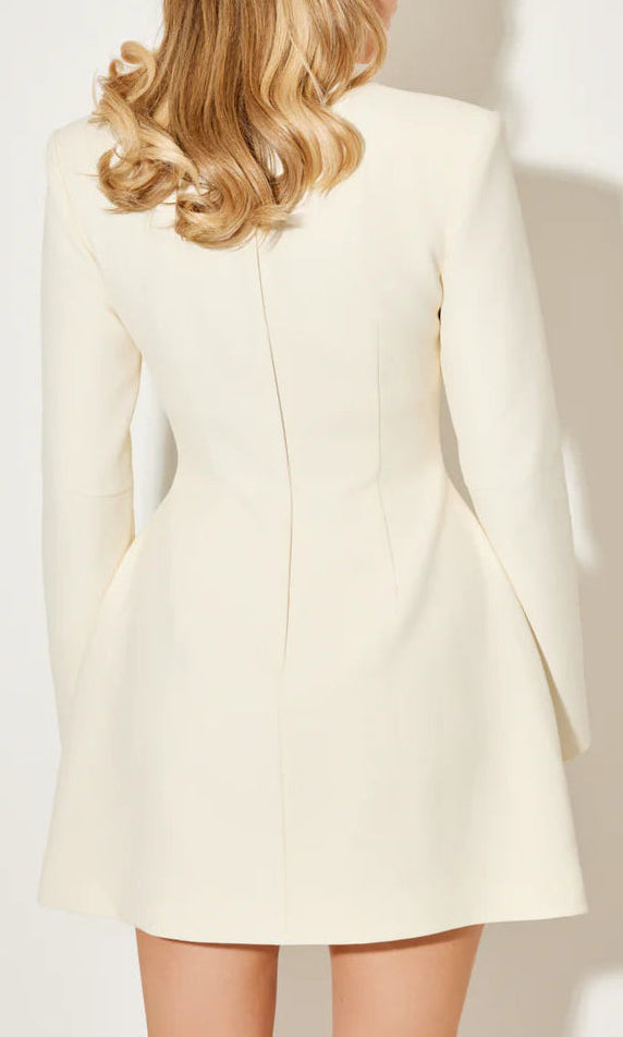 White Aurora coat dress with a statement bow collar by Lumina Vancouver, shown from the front with a clean, elegant design.