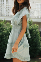 Baby blue Kerttu Sunset Boho mini dress by Lumina Vancouver featuring a bohemian style with flowing fabric and sunset-inspired design.