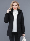 Lumina Wear Ava quilted hooded puffer jacket in green with streamlined fit, lightweight design, and quilted texture.