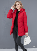 Lumina Wear Ava quilted hooded puffer jacket in green with streamlined fit, shown on a model in size XS.