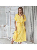 White Ayesha printed summer dress by Lumina Wear, lightweight and flowy, featuring floral patterns and casual style for warm weather.