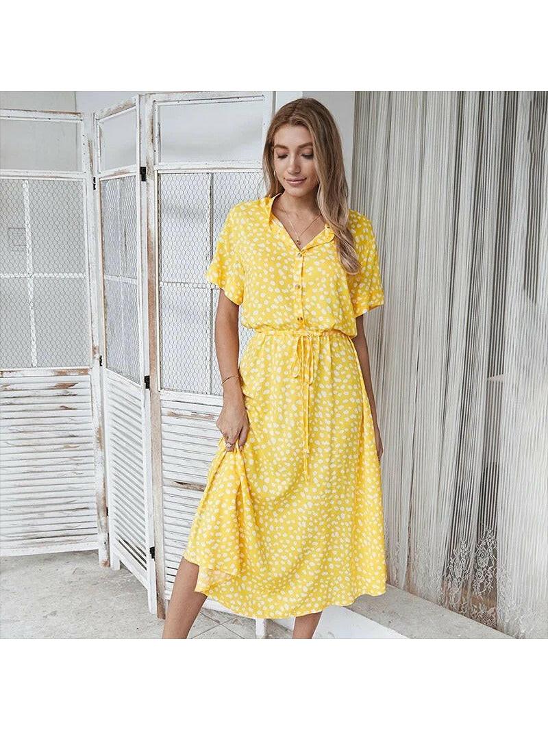 A white Ayesha™ printed summer dress by Lumina Vancouver, lightweight fabric, floral pattern, perfect for warm weather.
