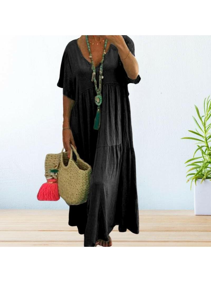 Beige Lumina Wear BAHAMA cotton linen dress displayed on a hanger, showcasing its relaxed, breathable fabric and casual style.