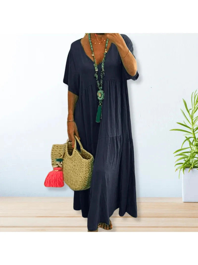 Beige BAHAMA cotton linen dress by Lumina Wear, lightweight and stylish, shown hanging with a relaxed fit and natural fabric texture.