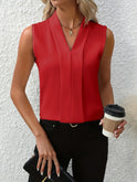 White Beatrice blouse by Lumina Wear featuring elegant pleated design and V-neck, perfect for stylish women's fashion.