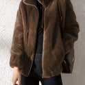 Beatrice plush cozy teddy fleece jacket with high collar from Lumina Wear in khaki, styled on a model.