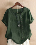 Pink Beatrice relaxed casual blouse by Lumina Wear with button details and a comfortable fit, shown on a model.