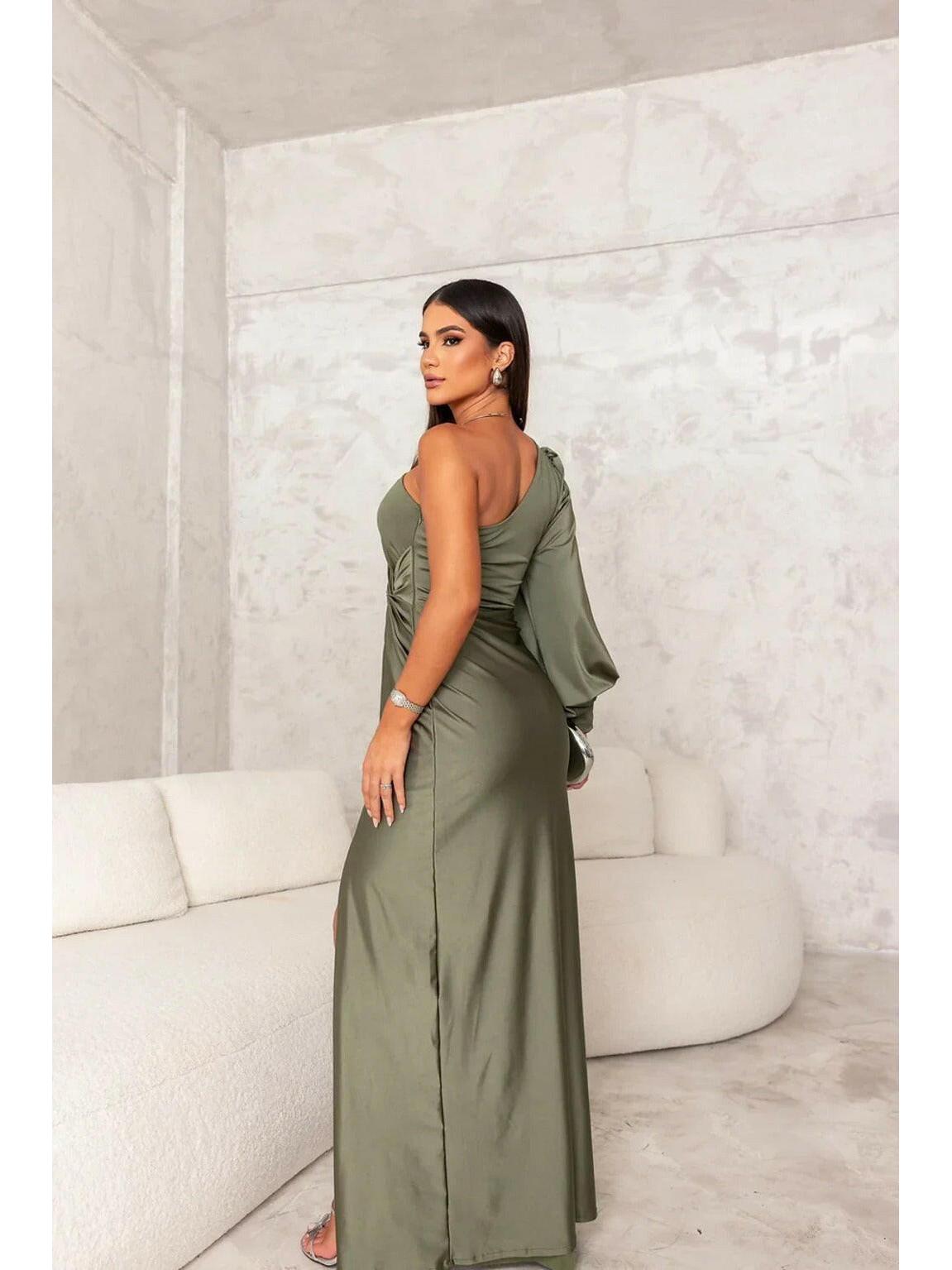 Olive green Becca Lumina Wear satin maxi dress with elegant design, suitable for wedding guests, shown on a model.
