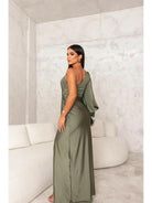 Olive green Becca satin maxi dress by Lumina Vancouver, elegant wedding guest gown with flowing fabric and sophisticated style.