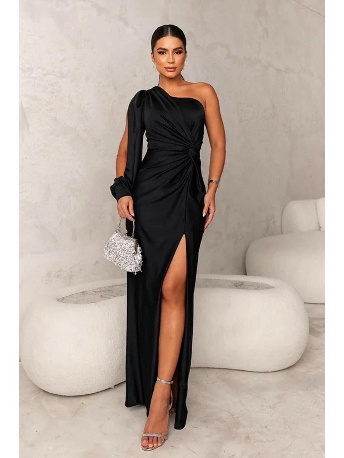 Elegant olive green satin maxi dress by Lumina Vancouver, perfect for wedding guests, with flowing fabric and stylish design.