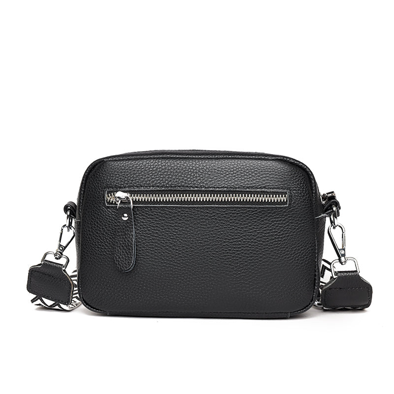 Lumina Wear Bella chic compact black leather shoulder bag for women, featuring a stylish design and versatile hand-held option.