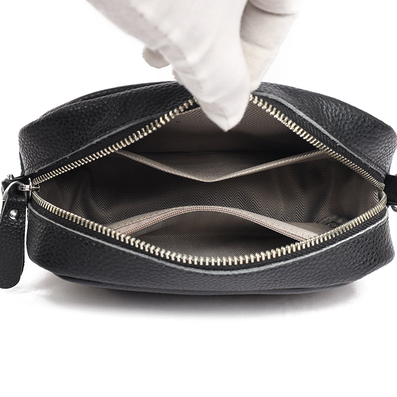 Lumina Wear Bella Chic Compact Black Leather Shoulder Bag with sleek design and adjustable strap for everyday style.