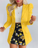 Purple floral blazer and skirt suit by Lumina Wear, tailored for women, featuring elegant floral pattern and fitted design.
