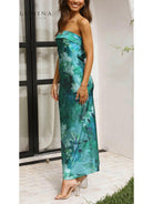 Pink Bellamy sleeveless floral maxi dress by Lumina Vancouver, perfect for wedding guests, shown on a model.