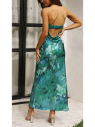 Pink Bellamy sleeveless floral maxi dress by Lumina Vancouver, perfect for wedding guests, shown on a model.