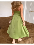 Green Ingunn strapless midi dress by Lumina Vancouver, featuring a chic, fitted design perfect for stylish occasions.