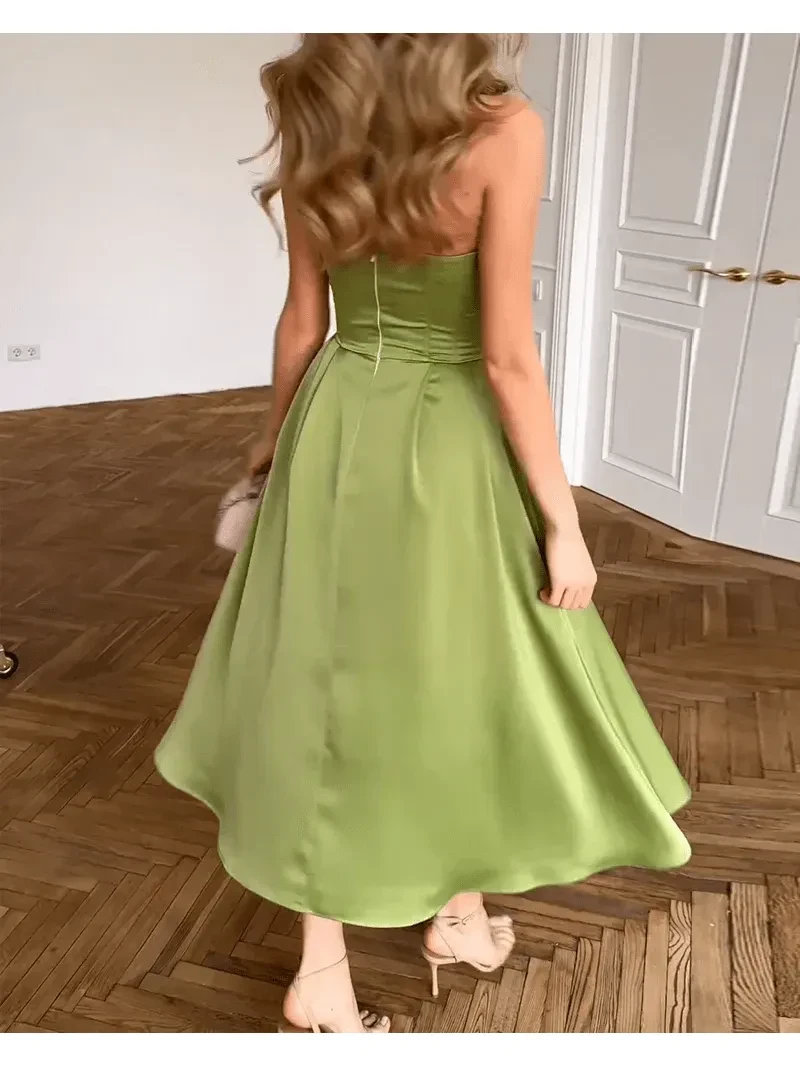 Green Ingunn strapless midi dress by Lumina Vancouver, featuring a chic, fitted design perfect for stylish occasions.