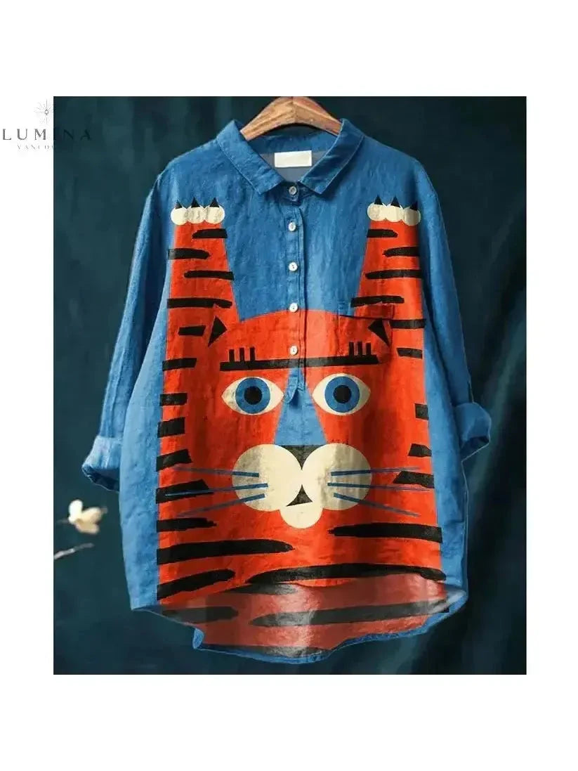 Multicolor Binky Feline Art Tee by Lumina Vancouver featuring vibrant cat illustrations on a casual t-shirt.