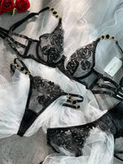 Black embroidered push-up lingerie set by Lumina Vancouver, 3-piece sexy lingerie with lace details and matching bra, panties, and garter belt.