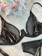 Black leather and mesh lingerie set with hollow designs, 3-piece Lumina Vancouver lingerie set displayed on a model.