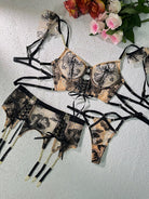 Black and nude ribbon sculpting body lingerie set, 3-piece by Lumina Vancouver, featuring intricate design and adjustable straps.
