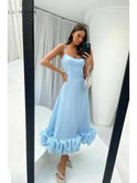 Black Blair Lumina Wear evening dress with flowing fabric, perfect for wedding guests, size 8-10, shown on a model.