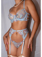 Blue floral embroidery lingerie set with pearl chain details, 3-piece collection from Lumina Vancouver featuring delicate fabric and intricate design.