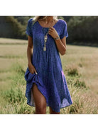 Callie spring dress by Lumina Vancouver with a colorful floral print, lightweight fabric, and a relaxed fit for warm weather.