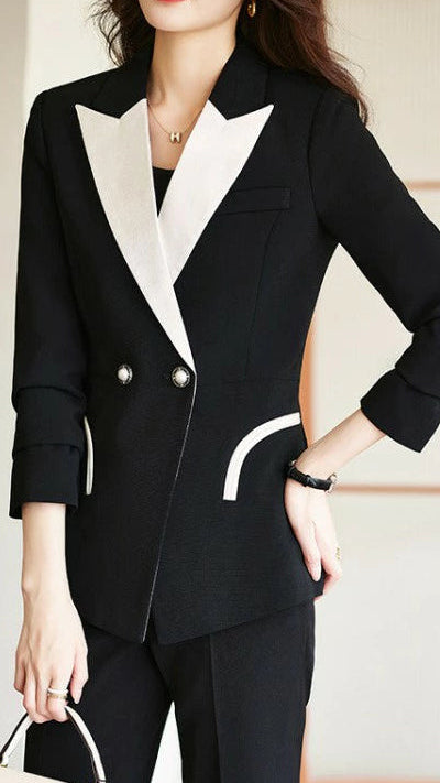 Black Camille monochrome tailored pant suit set by Lumina Vancouver, featuring a sleek, fitted design and modern styling.