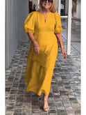 Red Carla puff-sleeve dress by Lumina Wear featuring elegant design, showcased on a model with a fitted silhouette.