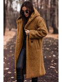 Beige Carol winter cozy coat by Lumina Wear, shown on a model with a high collar and warm, plush fabric for cold weather.