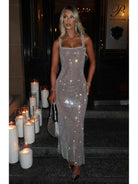 Lumina Vancouver Catherine Sparkling Maxi Dress, elegant evening gown with shimmering details, showcased on a model.