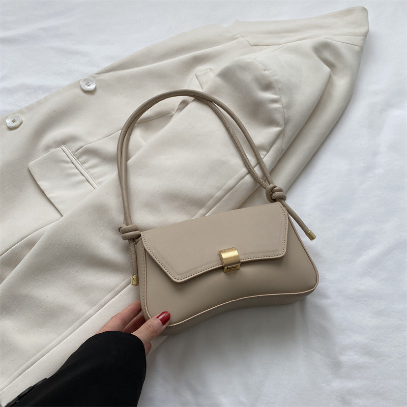 Lumina Wear Cécile sleek mini shoulder bag in terracotta with elegant design, featuring a compact silhouette and stylish details.