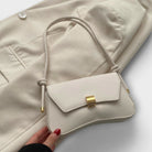 Lumina Wear Cécile mini shoulder bag in terracotta with a sleek design, featuring elegant craftsmanship and compact style.
