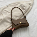 Terracotta Lumina Cécile mini shoulder handbag with sleek, elegant design and gold-tone hardware, perfect for stylish everyday use.