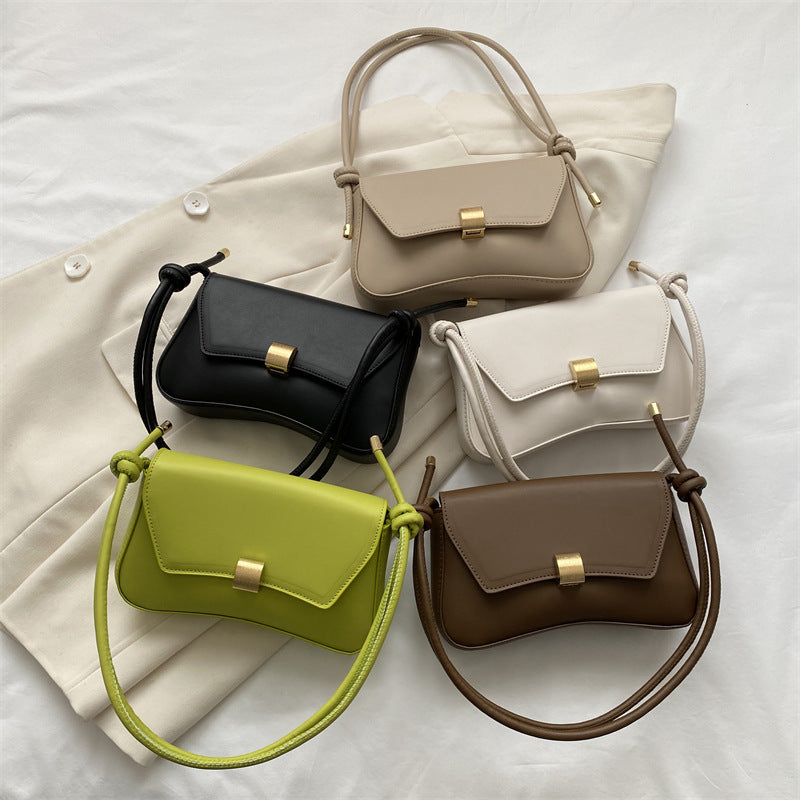 Lumina Wear Cécile mini shoulder handbag in terracotta with a sleek, elegant design, perfect for stylish everyday use.