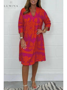 Blue and army green Bergljot spring dress by Lumina Vancouver, featuring a comfortable fit and floral pattern.