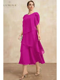 Pink Celestia classic chiffon dress by Lumina Wear, featuring flowing fabric and elegant design, displayed on a white background.