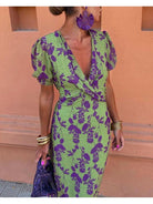 Elegant floral dress by Lumina Vancouver featuring a fitted bodice and flowing skirt, perfect for spring or summer occasions.