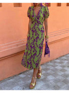 Lumina Vancouver Celia elegant floral dress, knee-length with colorful floral pattern, perfect for spring and summer occasions.