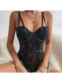 Black embroidered corset bodysuit by Lumina Wear, featuring detailed stitching and a fitted design, perfect for stylish outfits.